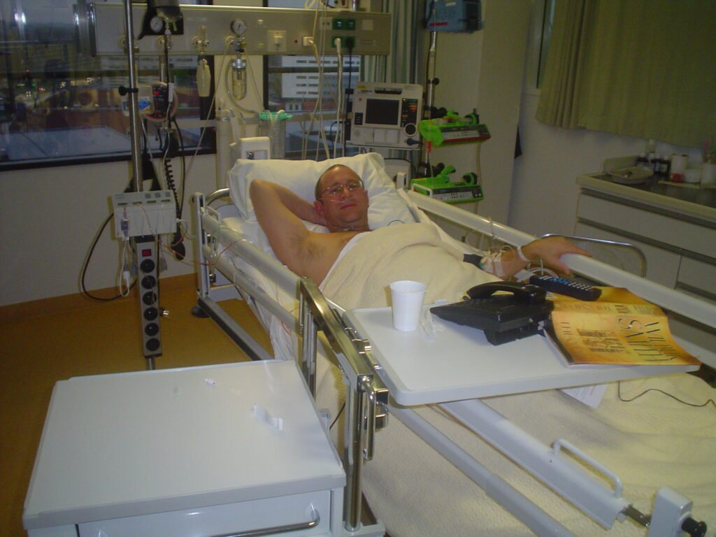 lying in hospital bed after heart attack